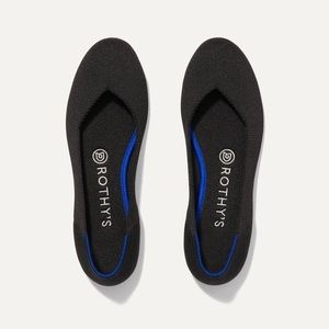 Rothy’s black rounded toe flats size 7.